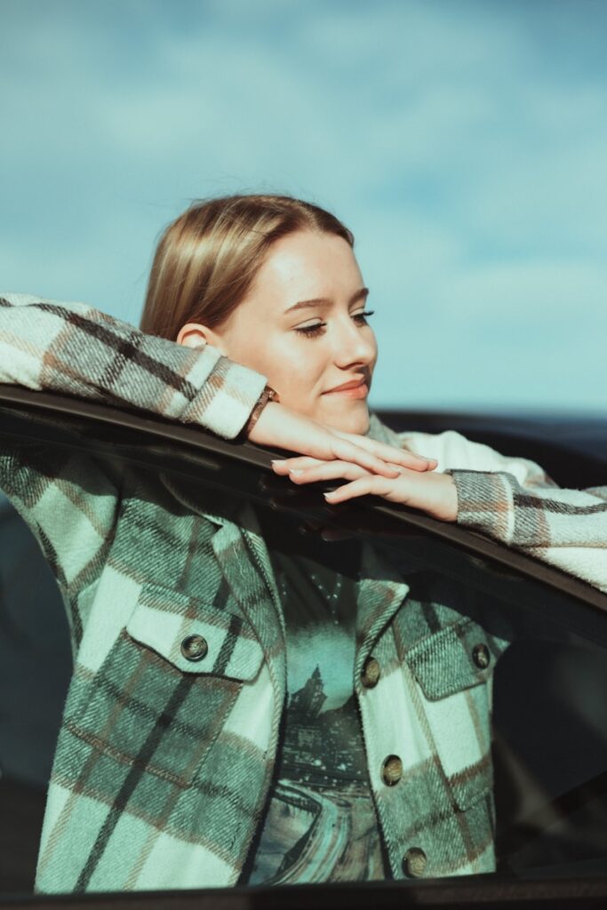 woman in green and white plaid scarf flannel