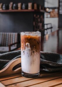 highball glass filled with iced coffee cold brew